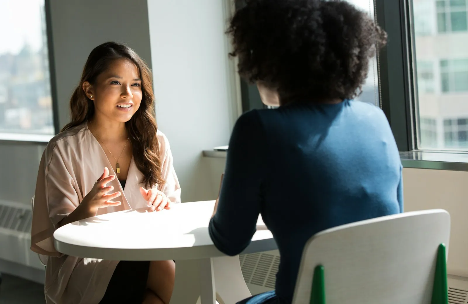 Customer support specialist meeting with a subscriber
